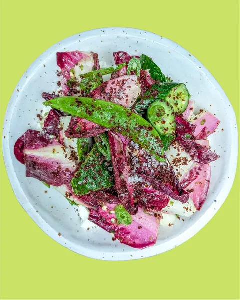 Radicchio salad with sugar snaps, cucumber and green chilli